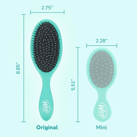 Wet Brush held in hand demonstrating size and ergonomic grip benefit