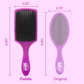 Wet Brush in shower with water passing through paddle demonstrating quick drainage benefit