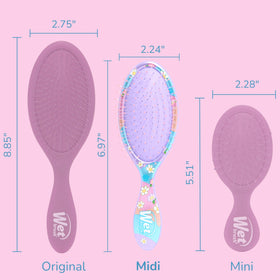 Wet Brush Bluey & Bingo in child's hand showing compact size that encourages independence