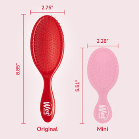 Wet Brush detangling wet hair in shower towel, reduces pulling