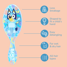 Child holding Wet Brush demonstrating ergonomic handle and independence benefit