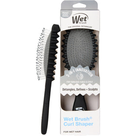 Wet Brush Curl Shaper front view showing brush shape and compact design for easy styling