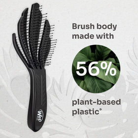 Wet Brush Go Green detangling wet curls smoothly with reduced tugging benefit