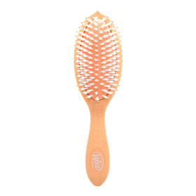 Wet Brush front packaging showing product and eco messaging
