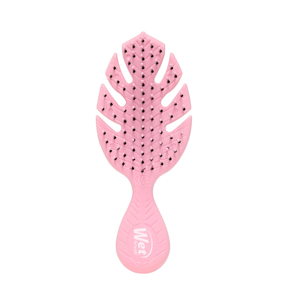Wet Brush Go Green front view showing compact pink detangler, easy travel benefit