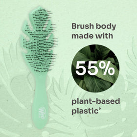 Wet Brush Go Green on dresser lifestyle shot showing daily-use convenience benefit