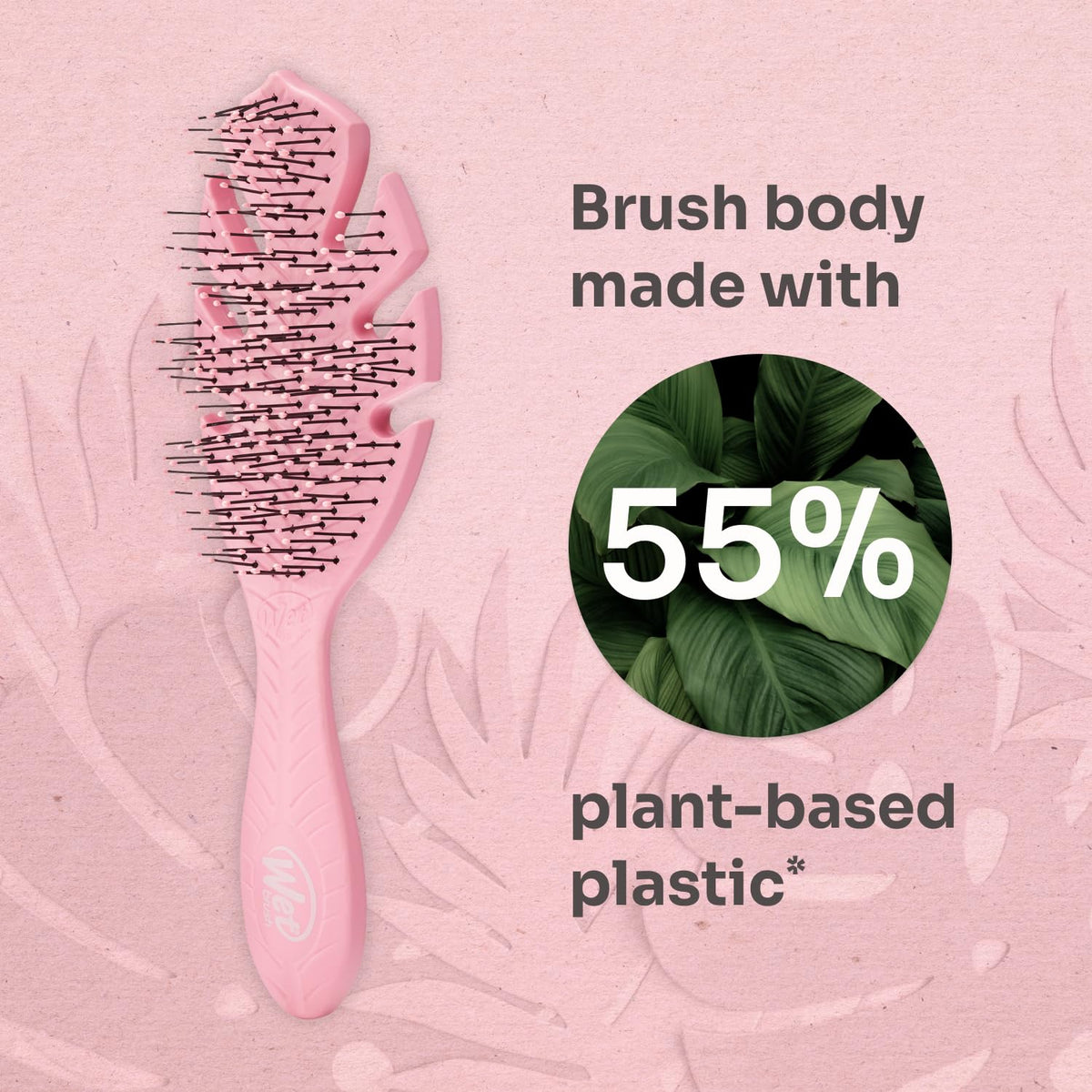 Wet Brush Go Green detangling wet hair after shower to gently loosen knots without tugging