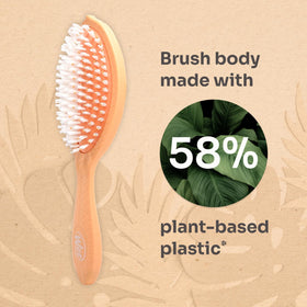 Wet Brush held in hand showing size and comfortable grip benefit