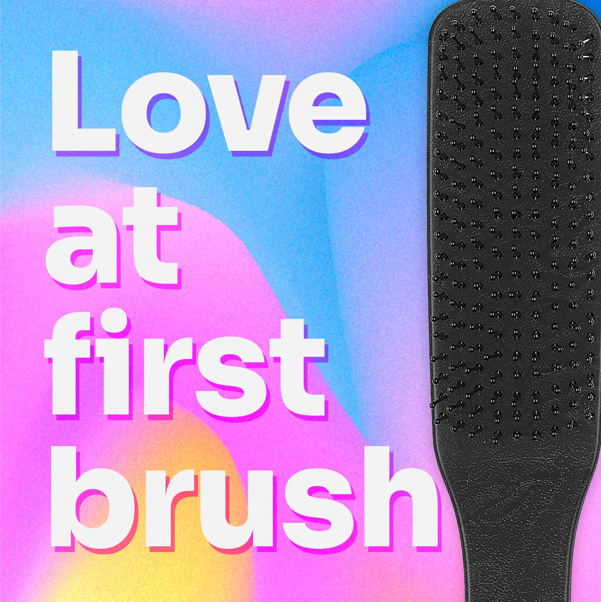 Wet Brush in hand scale demonstrating compact size and easy handling benefit