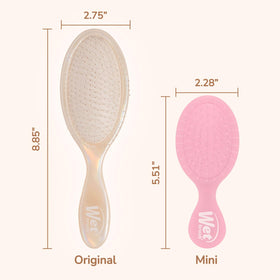 Wet Brush held in hand to show size and control for gentle brushing
