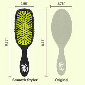 Wet Brush held in hand brushing wet hair for gentle detangling and less tugging