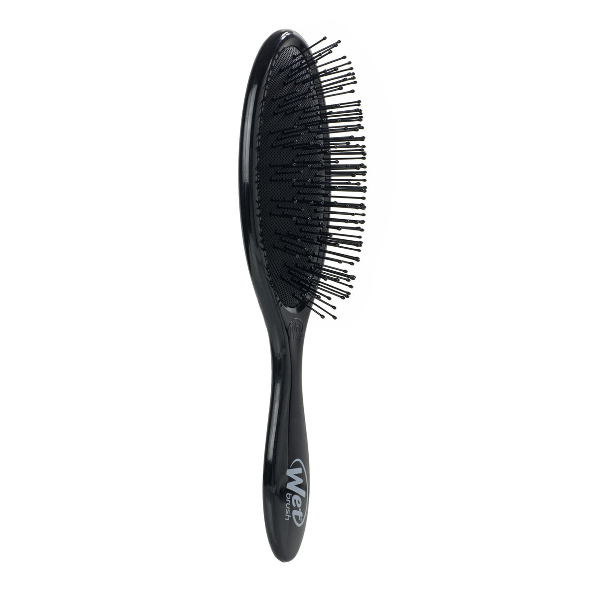 Wet Brush on bathroom counter styled with towel showing everyday salon-like results