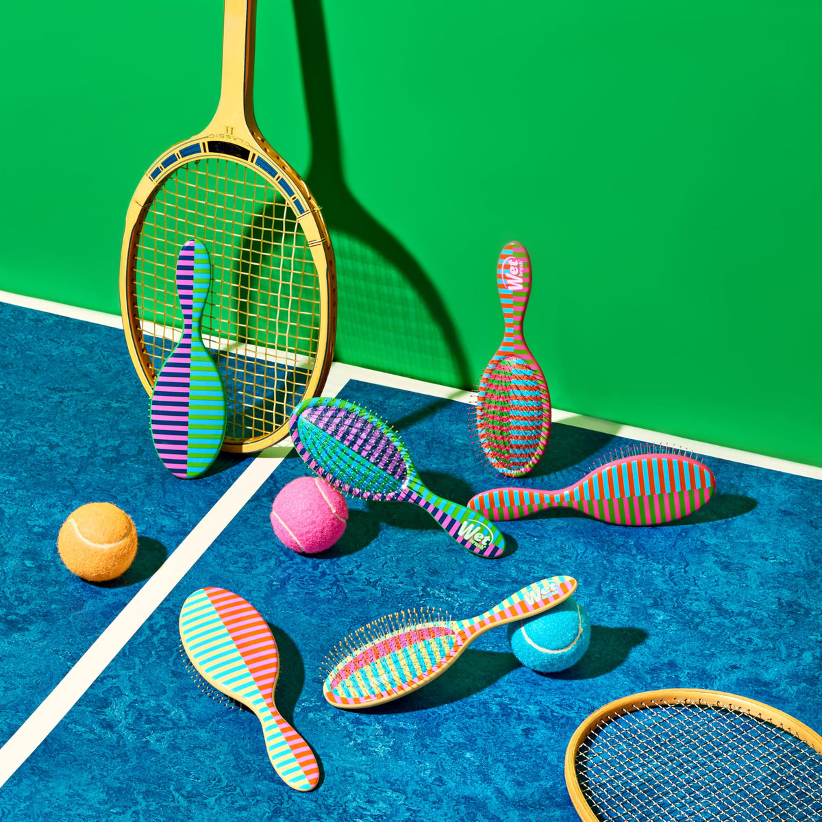 Wet Brush styled in a sporty bathroom setting to convey active, on-the-go lifestyle