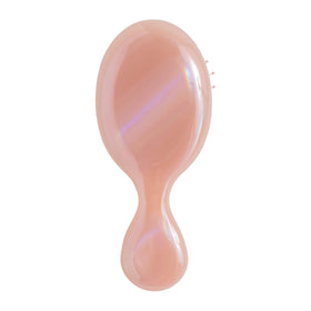 Wet Brush mini detangler front view showing compact design and portability