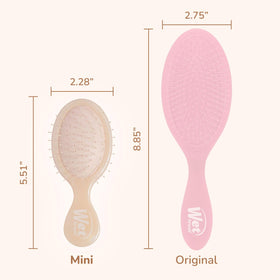 Wet Brush brushing wet hair to show smooth glide and reduced pulling benefit