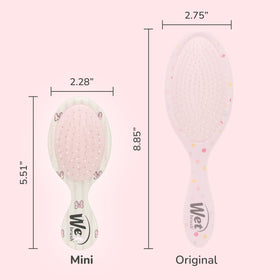 Wet Brush held in hand to show pocketable size and easy grip
