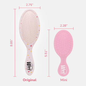 Wet Brush Minnie brushing wet hair demonstrating gentle detangling without tugging
