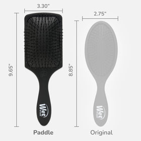 Wet Brush held in hand to show paddle size and better coverage for long hair