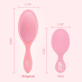 Wet Brush held in hand demonstrating comfortable grip for quick styling