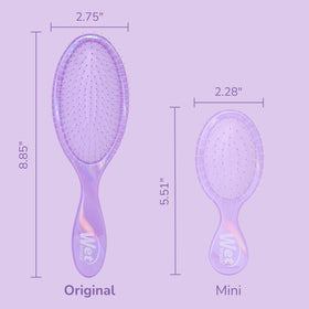 Wet Brush prismatic glow held in hand to show size and easy control during brushing