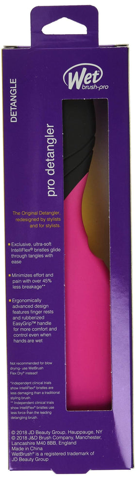 Wet Brush Pro next to a hand to show size and ergonomic scale for easy handling