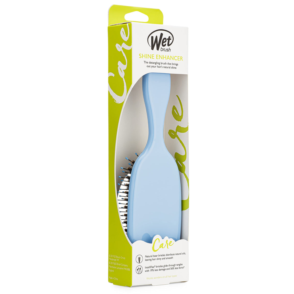 Wet Brush held in hand to show scale and comfortable grip for daily brushing