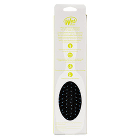 Wet Brush detangling wet hair demonstrating gentle glide and fewer snags