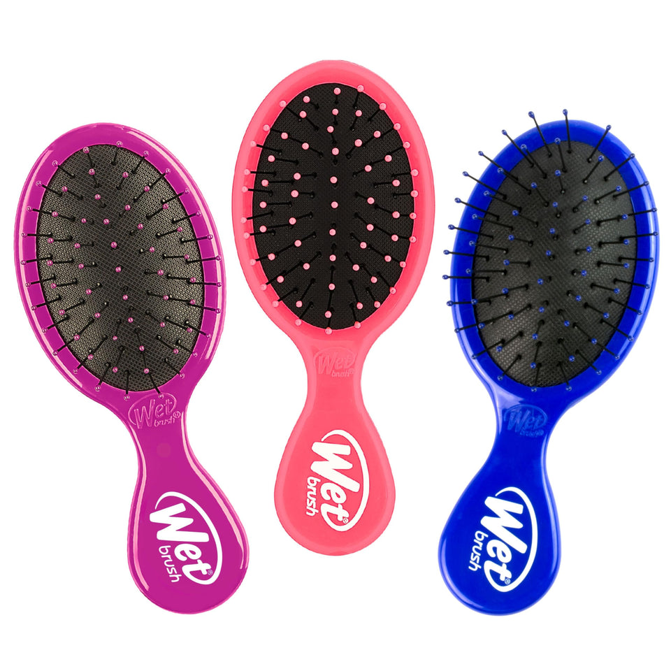 Wet Brush mini detangler front view showing pink purple blue trio and portability benefit