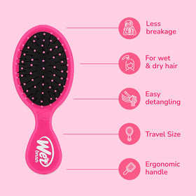 Wet Brush mini detangler side profile highlighting slim compact design advantage