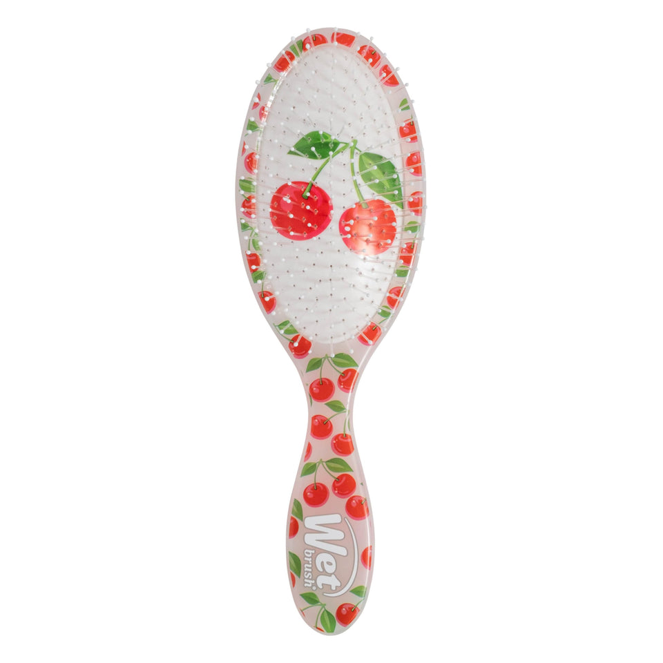 Wet Brush front packaging in Tutti Fruitti Cherry shows playful finish and easy grip benefit