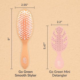 Wet Brush brushing wavy hair to reduce frizz and enhance definition