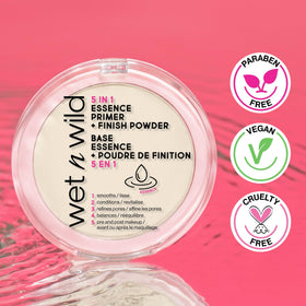 wet n wild applying powder with brush to set makeup for longer wear benefit