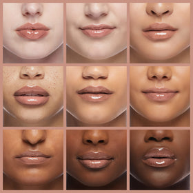 wet n wild swatch on lips demonstrating rose gold color and luminous effect