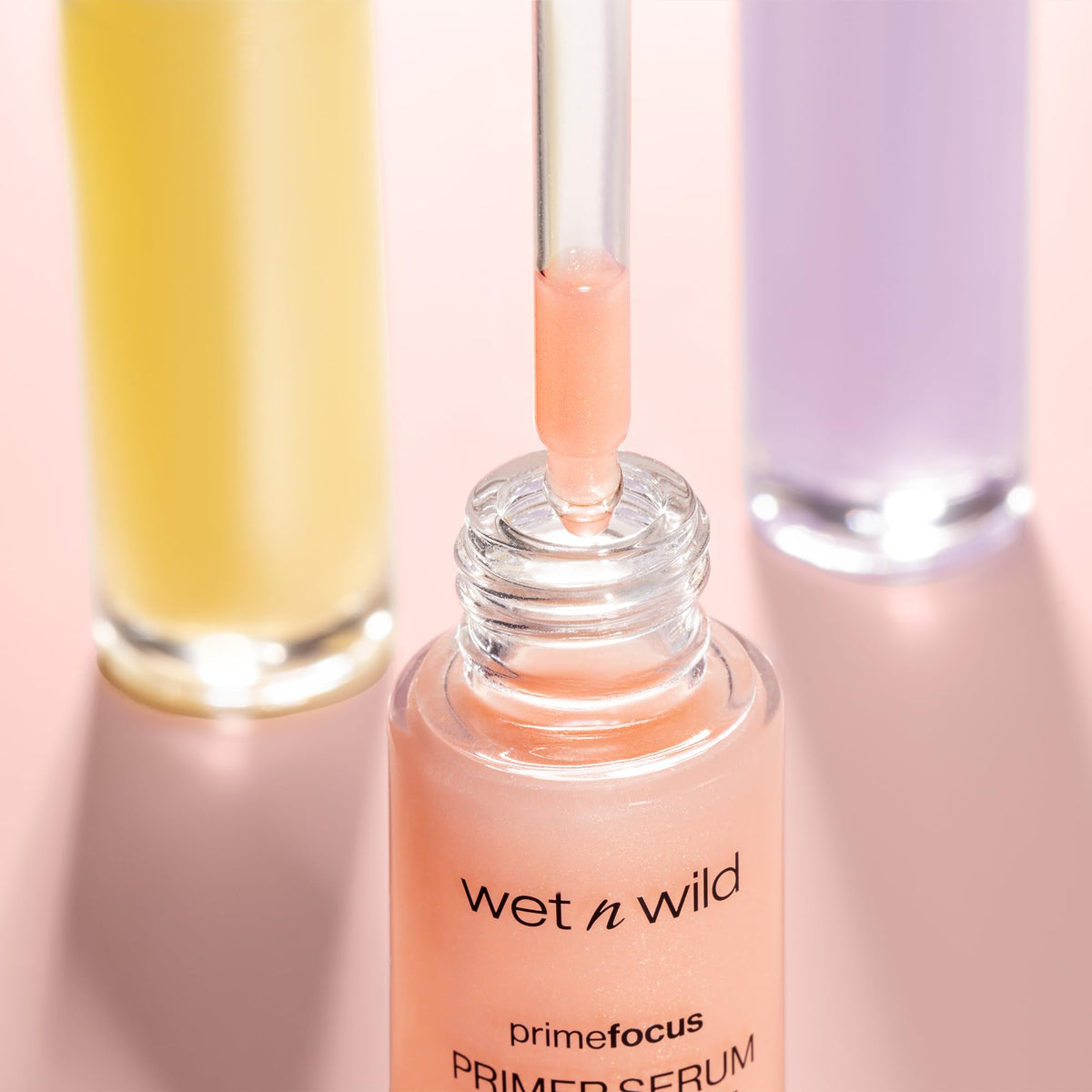 wet n wild applying primer on forearm for smoothing demonstration
