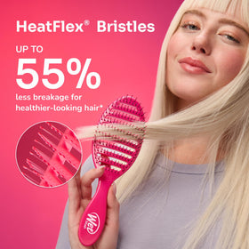 Wet Brush in hand to show scale and lightweight design for easy daily use