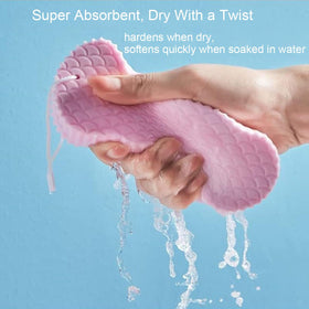 WFWJ sponge next to hand to show size and coverage for faster bath routines