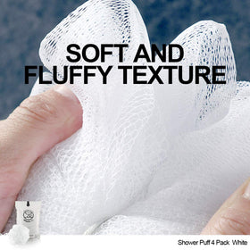 WhaleLife loofah held in hand for scale, oversized pouf for faster coverage