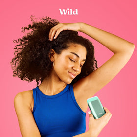 Wild deodorant in bathroom setting showing natural scent and everyday use benefit