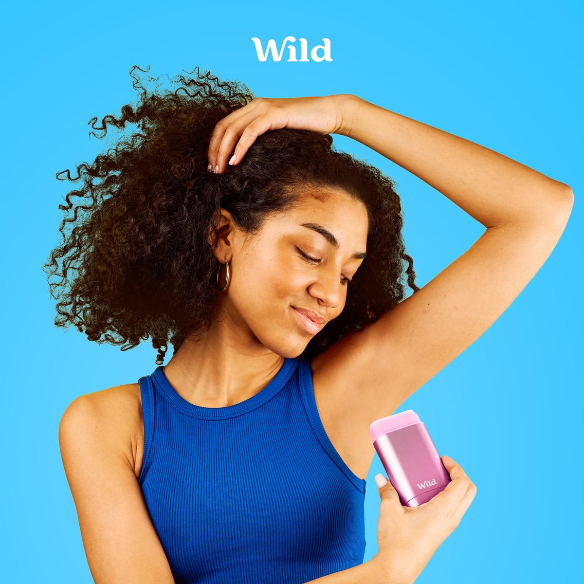 Wild refills on a bathroom shelf in a minimalist scene highlighting sustainable routine