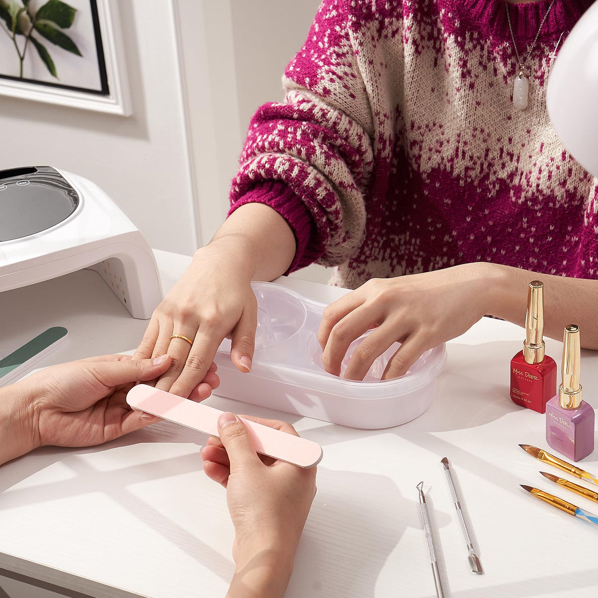 Wilfniee included nail file and cuticle pusher showing convenience benefit