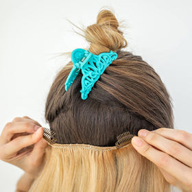 WILLBOND clips on dressing table beside styling tools for travel-ready convenience