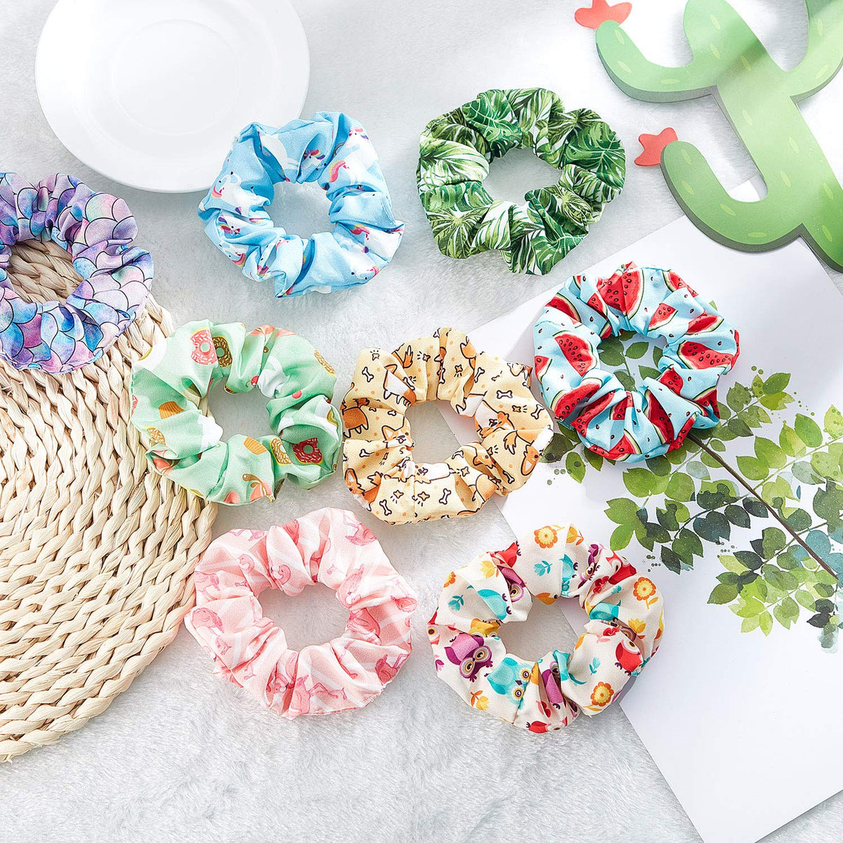 Size comparison of WILLBOND scrunchie next to a coin showing compact, wearable proportions