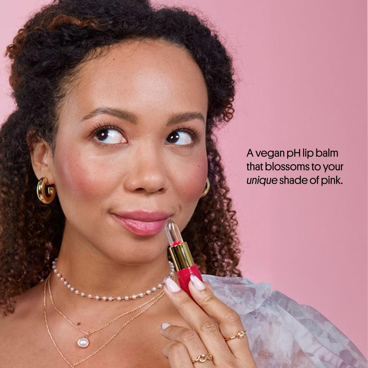 Winky Lux balm with vanilla bean prop suggesting sweet vanilla scent benefit