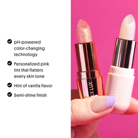 Winky Lux balm beside vanilla pod emphasizing scent and sensory appeal