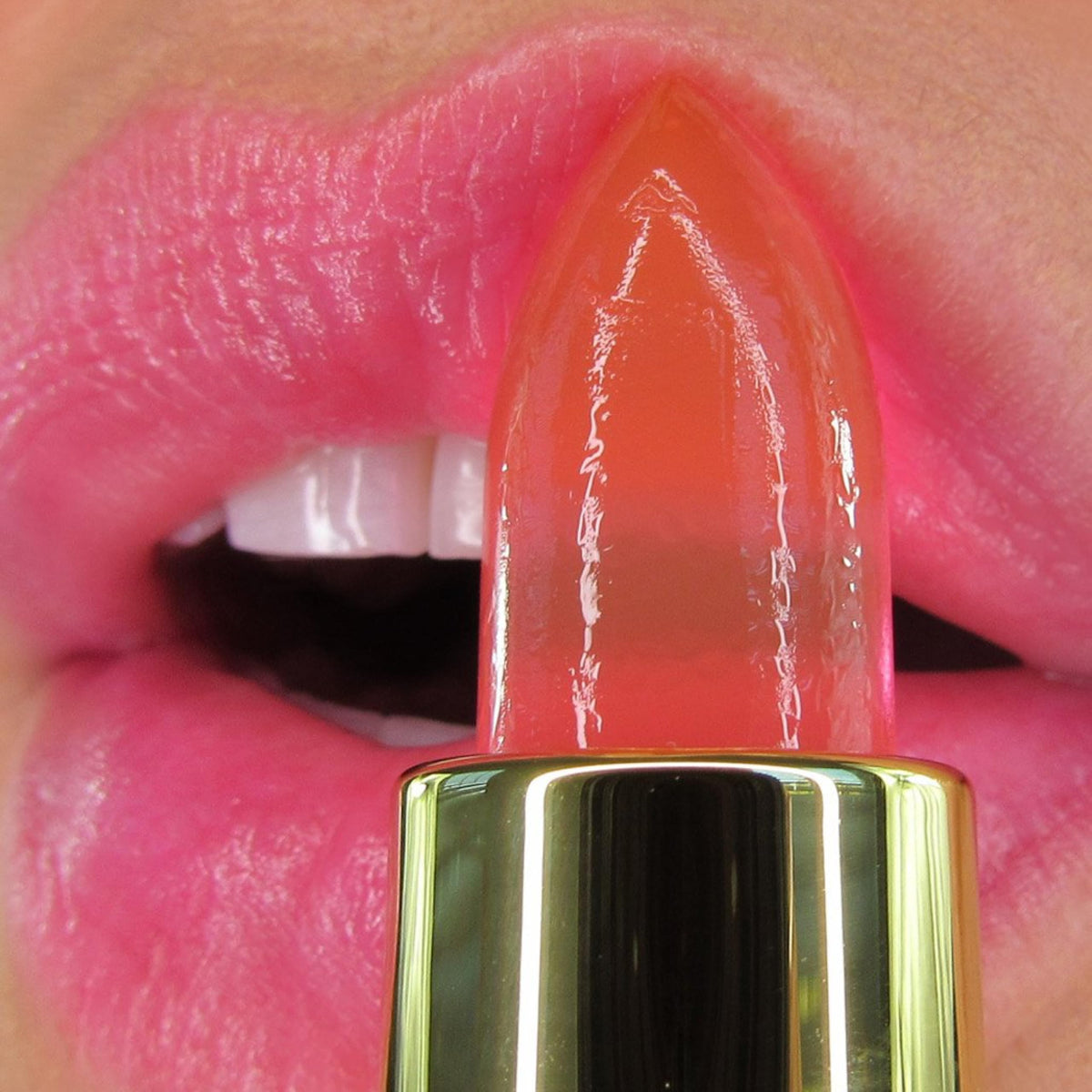 Winky Lux swatch on skin revealing sheer pink tint, demonstrates personalized color