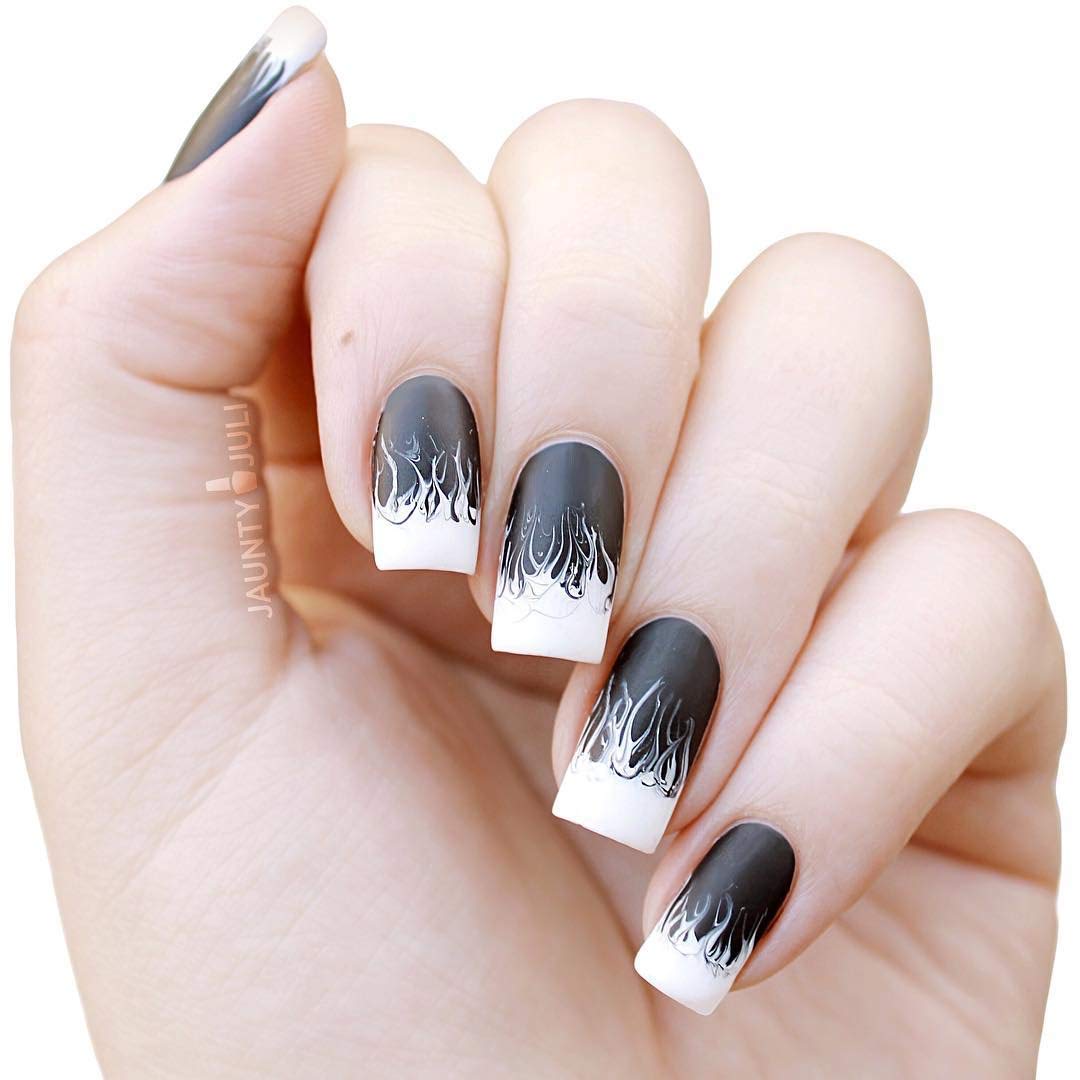 Winstonia brush in use drawing crisp stripes on a nail for steady paint release