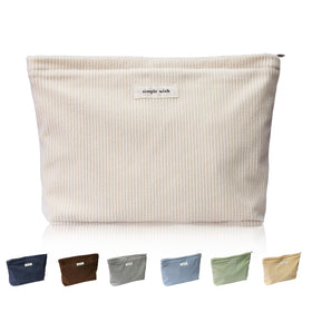 Wudygirl front view beige pouch shows stylish corduroy and safe storage