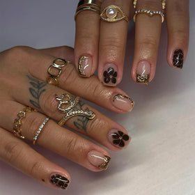 WYFHDT close-up of 3D floral detail on nail, shows texture and craftsmanship