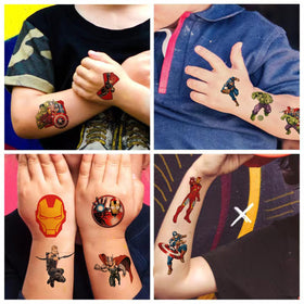 WYKDAG tattoo on a child’s hand for scale showing child-friendly sizing