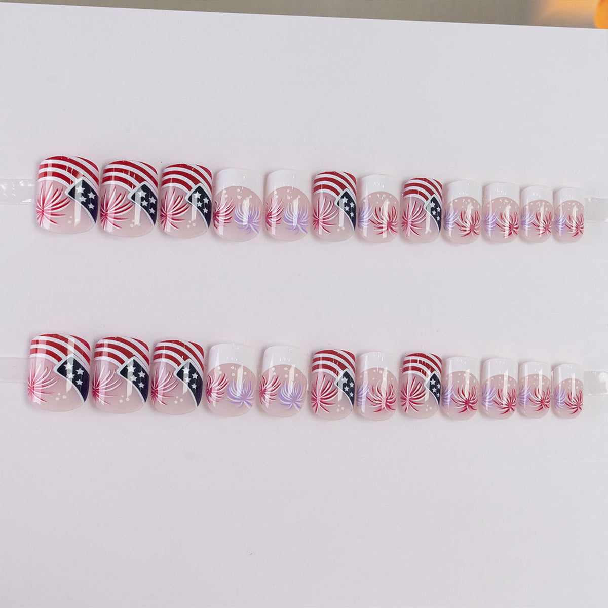 Xenophoer close-up of mixed American flag and accent nail designs for festive styling
